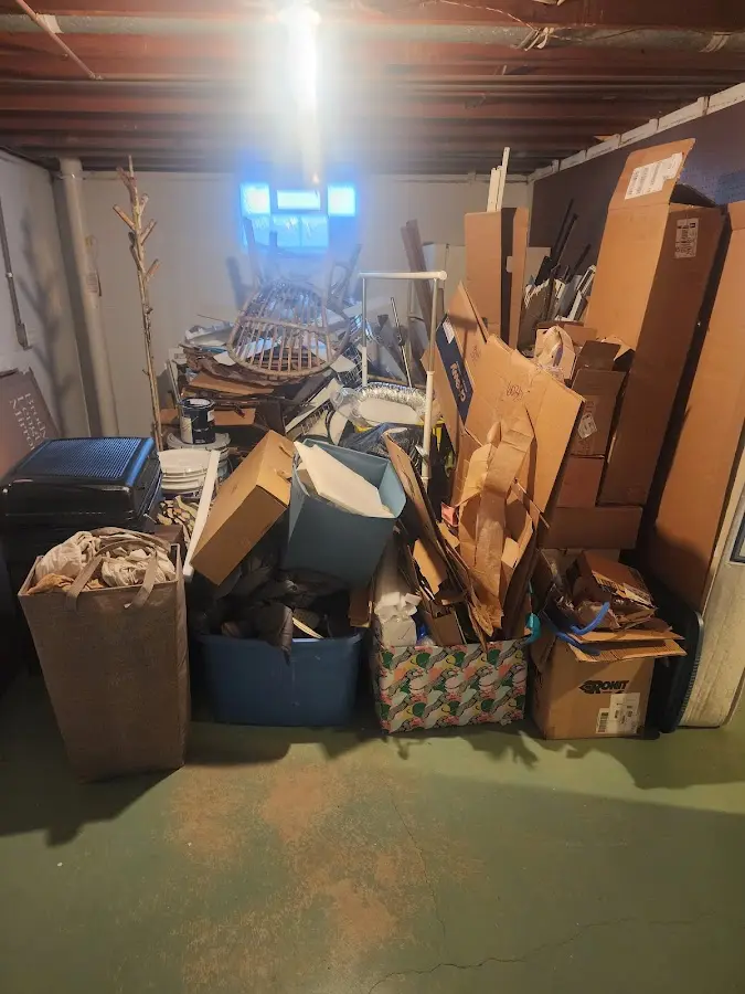 Roll-off dumpster container at job site for 8 Yard Dumpster Rental in Buhl